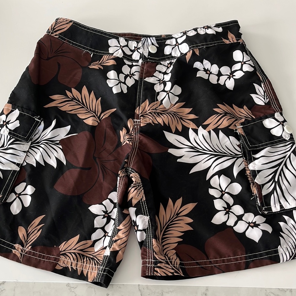 Brown multi color Hawaiian print Board Shorts.